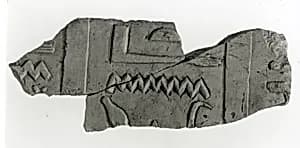 Raised relief fragment by Unknown Artist