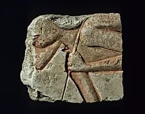 Relief with a stooped workman by Unknown Artist