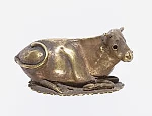 Resting bovine amulet by Unknown Artist