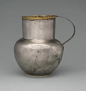 Silver jug with gold rim by Unknown Artist
