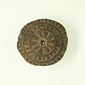 Spindle whorl by Unknown Artist