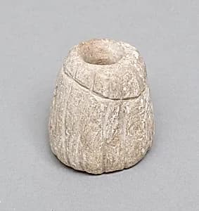 Spindle whorl by Unknown Artist