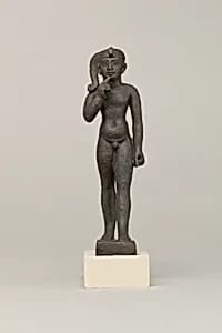 Statuette of a child god by Unknown Artist