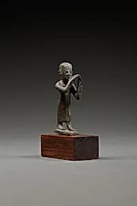 Statuette of a flutist by Unknown Artist