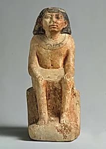 Statuette of man by Unknown Artist