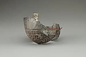 Strainer or vase fragment by Unknown Artist