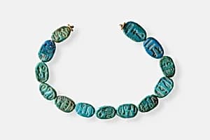 Strand of Inscribed Scarabs by Unknown Artist