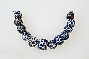 String of 12 Eye Beads by Unknown Artist
