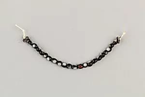 String of 22 eyed beads by Unknown Artist