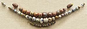 String of 4 Bugle Beads by Unknown Artist