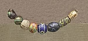 String of 8 Beads by Unknown Artist