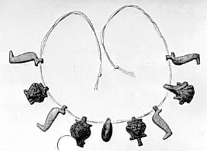 String of amulets by Unknown Artist