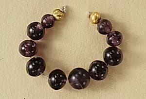 String of beads by Unknown Artist