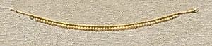 String of elongated disk beads by Unknown Artist