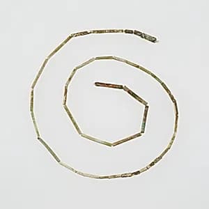 String of tubular beads by Unknown Artist