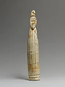 Tusk figure of a man by Unknown Artist