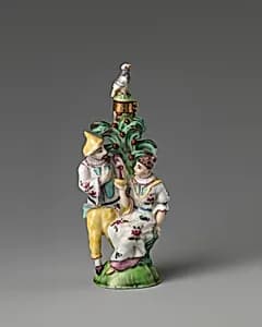 Chinese couple in a group by Saint James's Factory