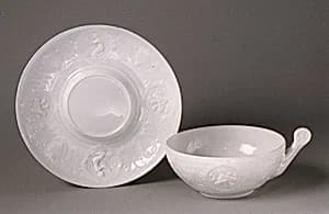 Cup and saucer by Pouyat