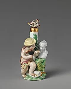 Cupid as sculptor by Chelsea Porcelain Manufactory