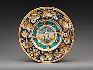 Dish with winged putto by Cipriano Piccolpasso