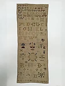 Embroidered sampler by Unknown Artist