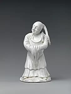 Figure of a Chinese man by Saint-Cloud factory|Rue de la Ville l'Evêque
