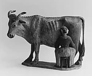 Girl milking a cow by Unknown Artist