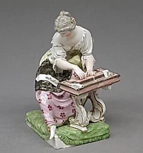 Lady seated at spinet by Ludwigsburg Porcelain Manufactory|Johann Christian Wilhelm Beyer