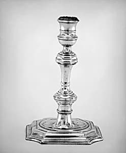 Pair of candlesticks by Paul de Lamerie