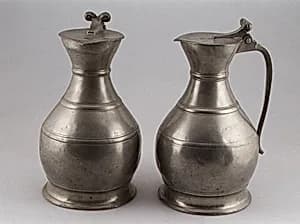 Pair of flagons by Joseph Samain