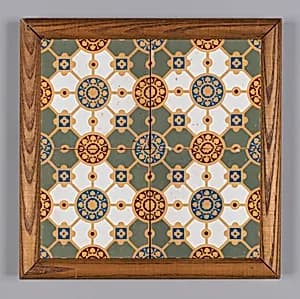 Panel of four tiles, framed