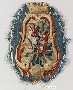 Rocaille cartouche with flowers by Beauvais