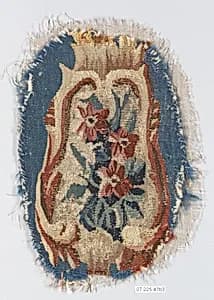 Rocaille cartouche with flowers by Beauvais