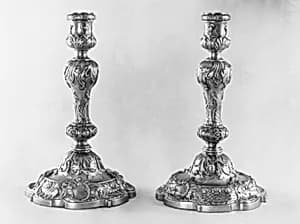 Set of four candlesticks by George Wickes