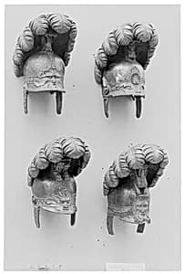 Set of four casques by Unknown Artist