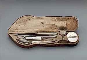 Traveling set in leather case by Unknown Artist