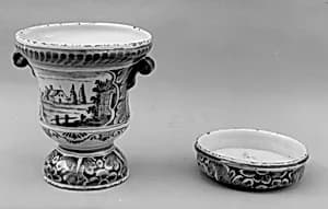 Vase and coaster by de Porceleyne Lampetkan
