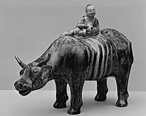 Water buffalo with boy by Whieldon type