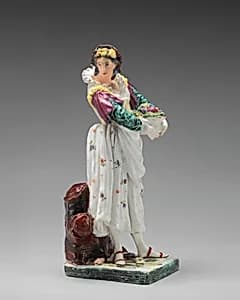 Woman carrying a basket of flowers by Chelsea Porcelain Manufactory