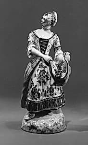 Woman with flowers by Limbach Porcelain Manufactory