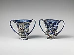A pair of glass drinking cups by Unknown Artist