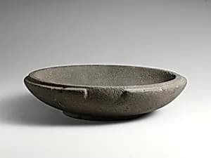 Basalt mortar or plate by Unknown Artist