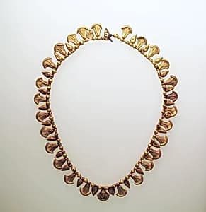Bead pendant, with lotus flowers by Unknown Artist