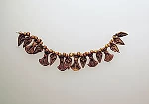 Bead pendant, with lotus flowers by Unknown Artist