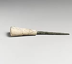 Bronze awl with bone handle by Unknown Artist