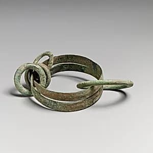 Bronze bracelet with four rings by Unknown Artist