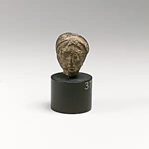 Bronze head of a goddess by Unknown Artist