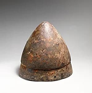 Bronze helmet of conical shape by Unknown Artist