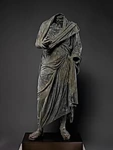 Bronze statue of a man by Unknown Artist