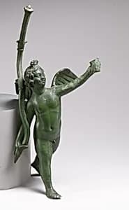 Bronze statuette of Eros running by Unknown Artist